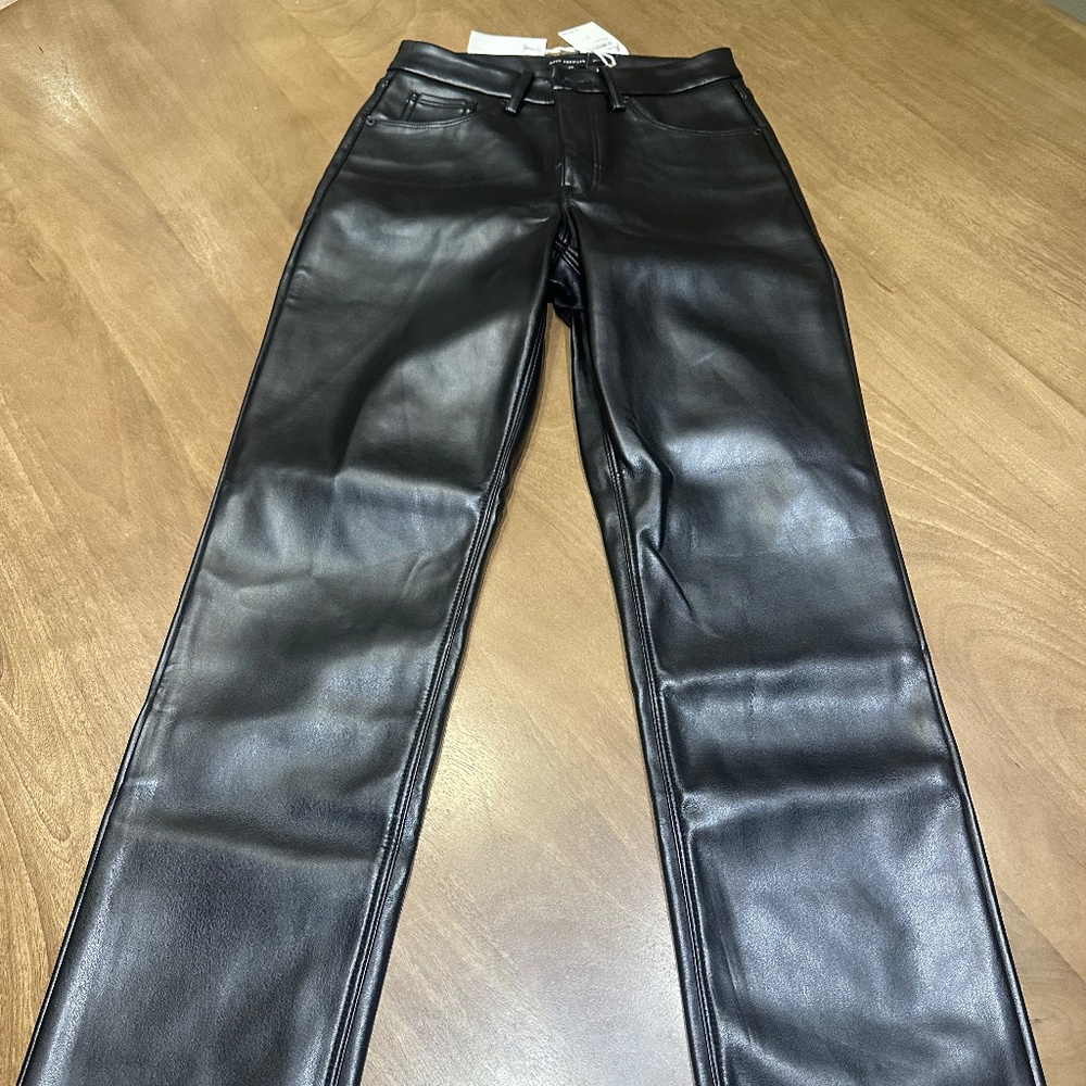 Good American black leather straight pants.